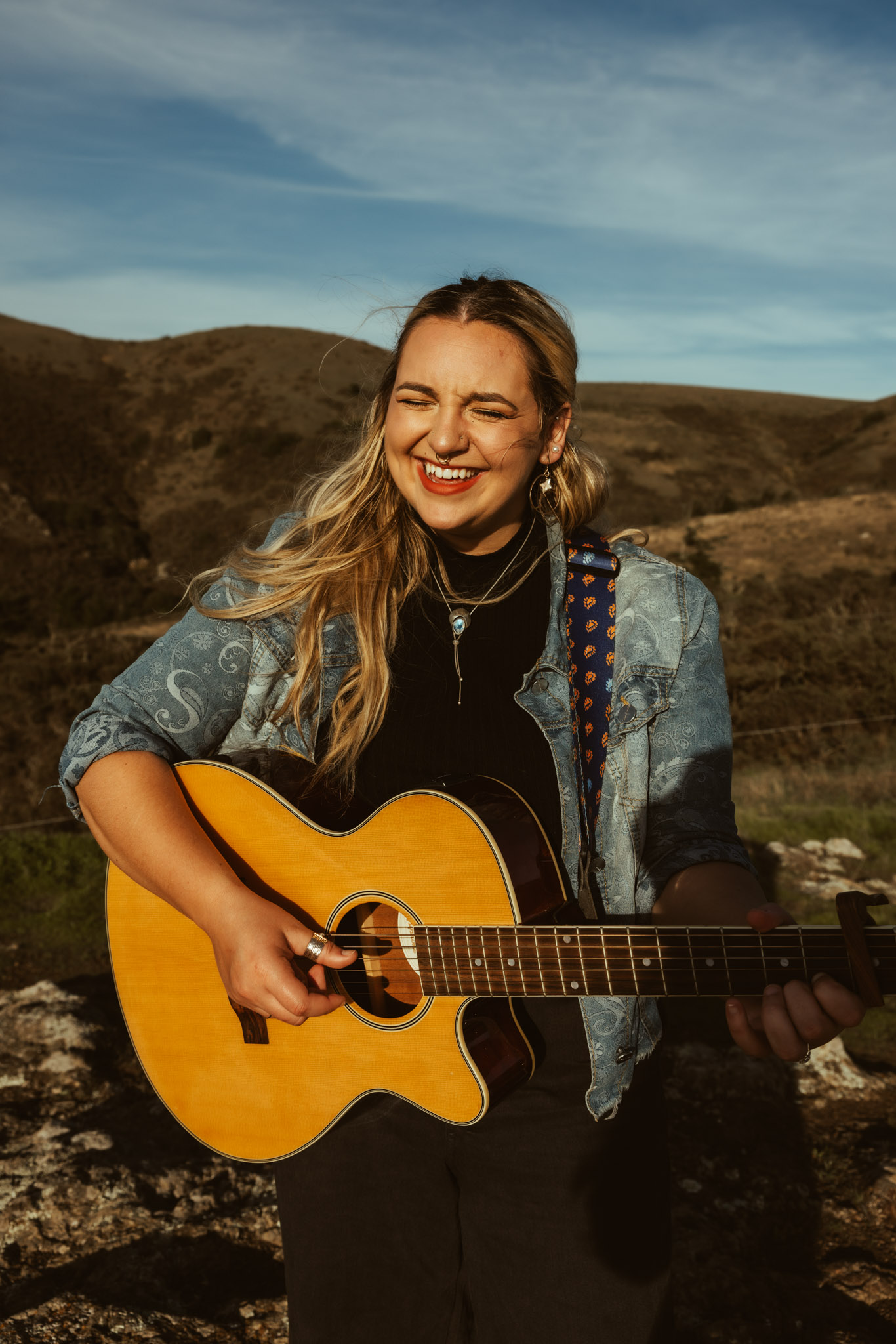 Sunny Mitchell with guitar
